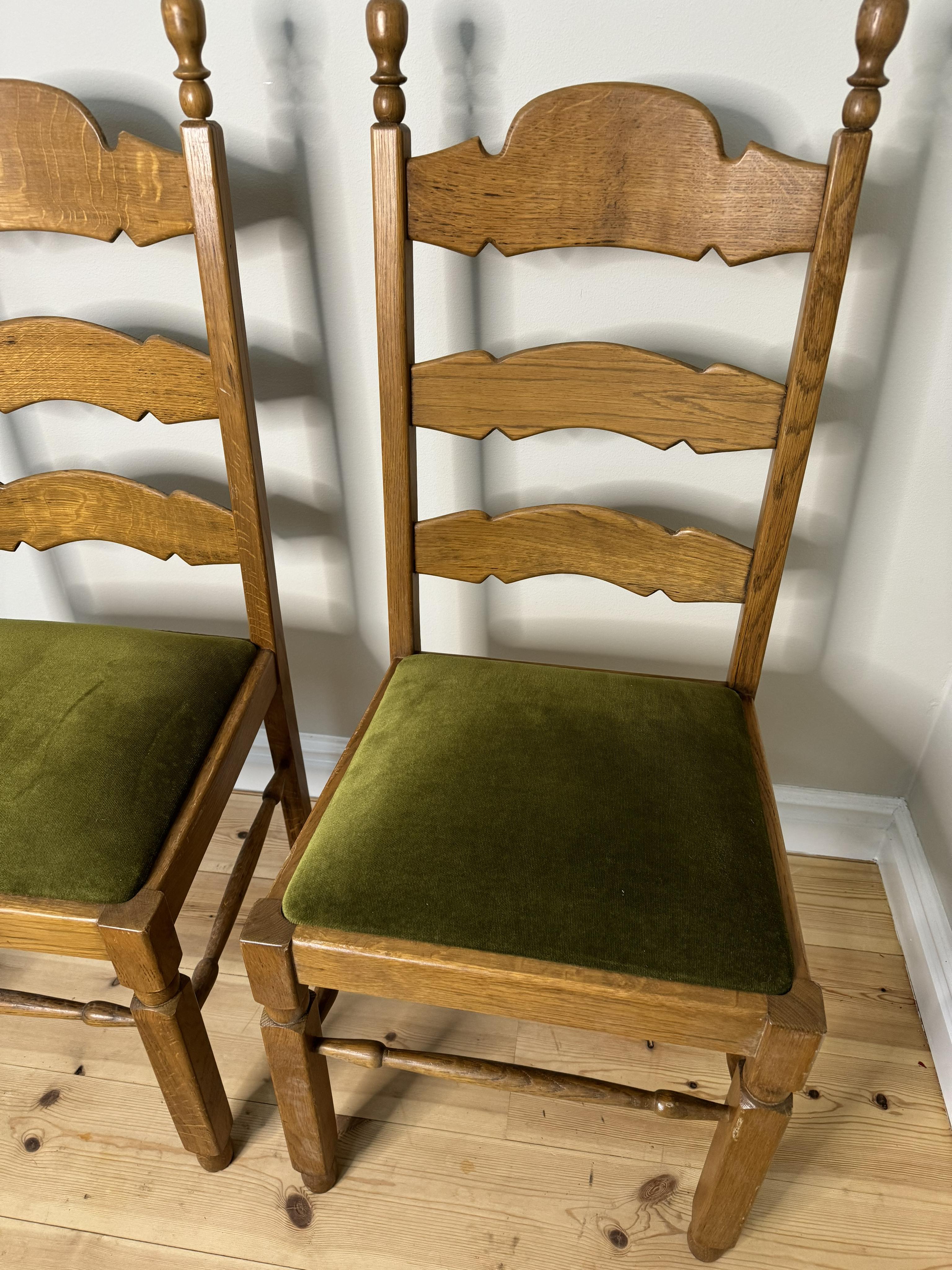 Wooden chairs with green fabric