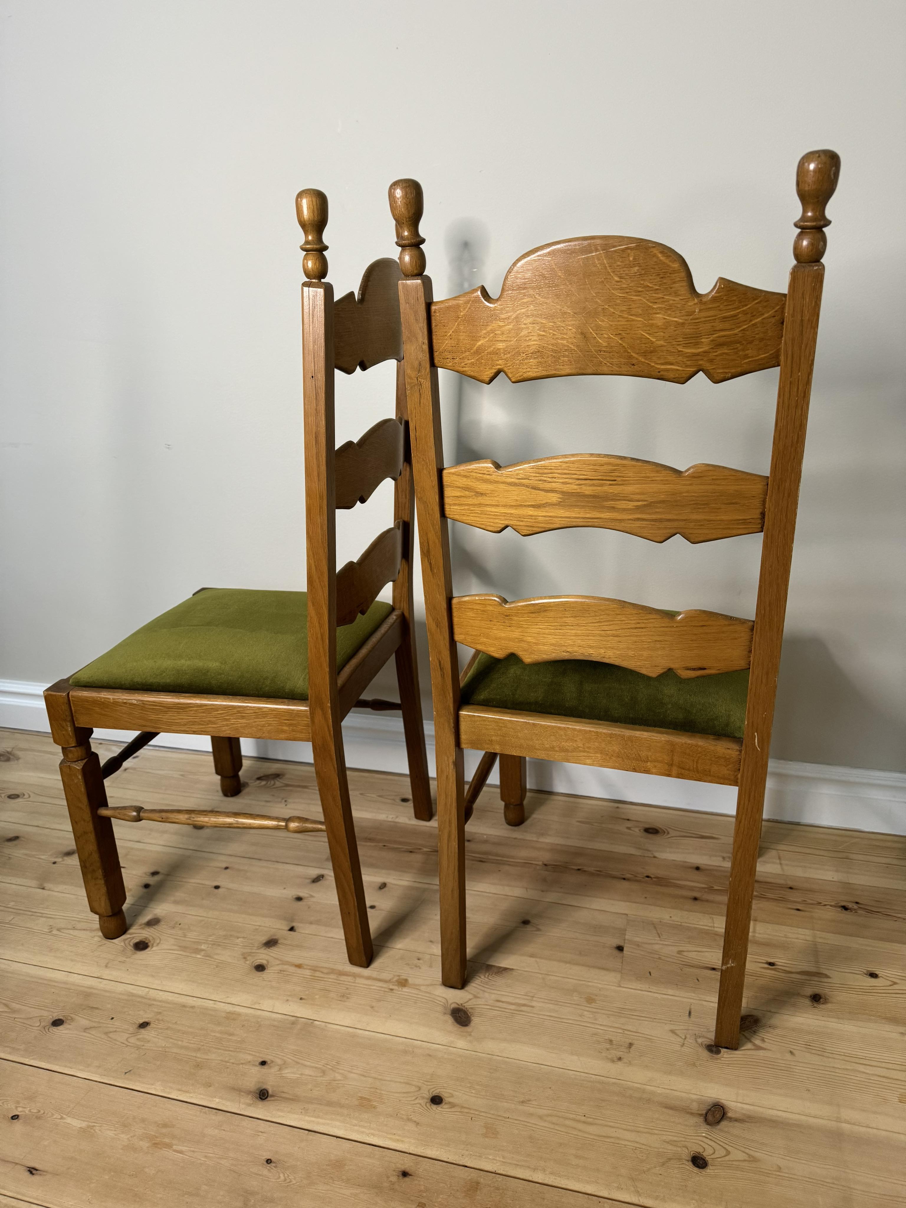 Wooden chairs with green fabric